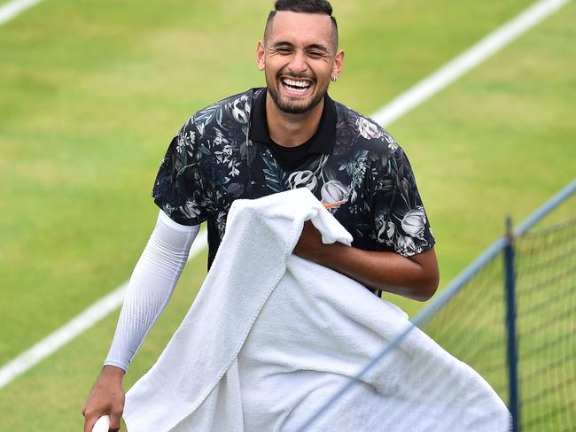 Australia's Nick Kyrgios reacts against Spain's Roberto Carballes Baena during their men's singles round of 32 tennis match at the ATP Fever-Tree Championships tournament at Queen's Club in west London on June 20, 2019. (Photo by Glyn KIRK / AFP)