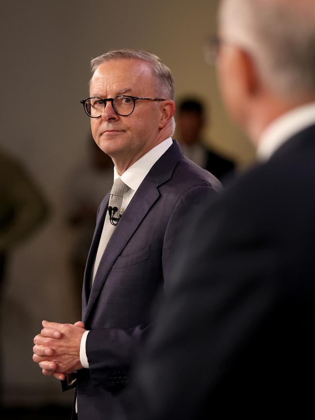 Opposition leader Anthony Albanese watches Prime Minister Scott Morrison during the first leaders’ debate on April 20. Picture: Toby Zerna – Pool/Getty