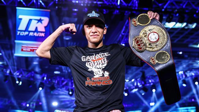 Joshua Franco poses with the WBA super flyweight belt. Picture: Mikey Williams/Top Rank/Getty