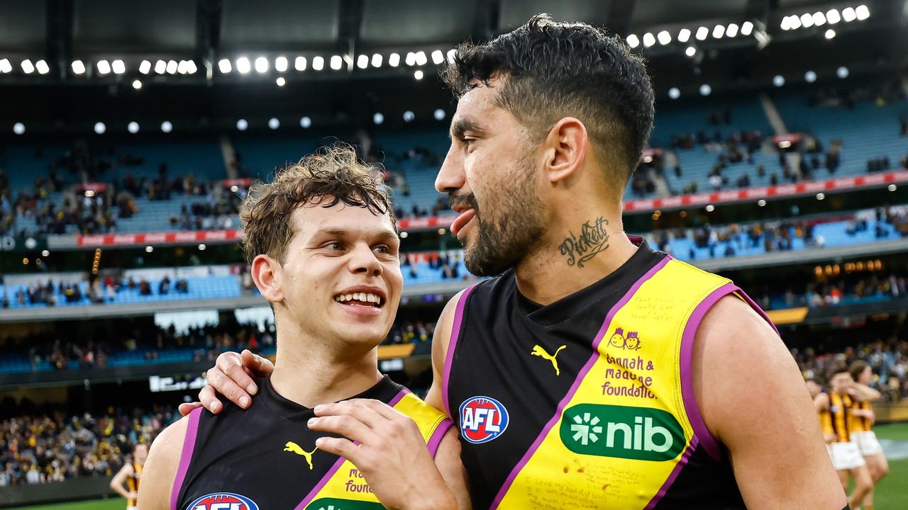 Mabior Chol (left) of the Tigers grapples with Caleb Graham (right) of the  Suns during the Round 12 AFL match between the Richmond Tigers and Gold  Coast Suns at the Gabba in