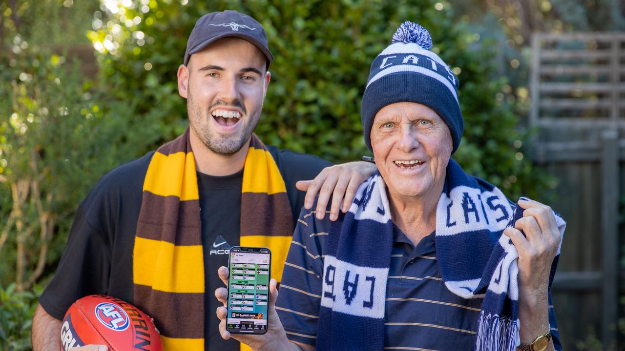 John Blackmore, 82, loves playing KFC SuperCoach with his grandson, Matt Howard, 27. Picture: Jason Edwards