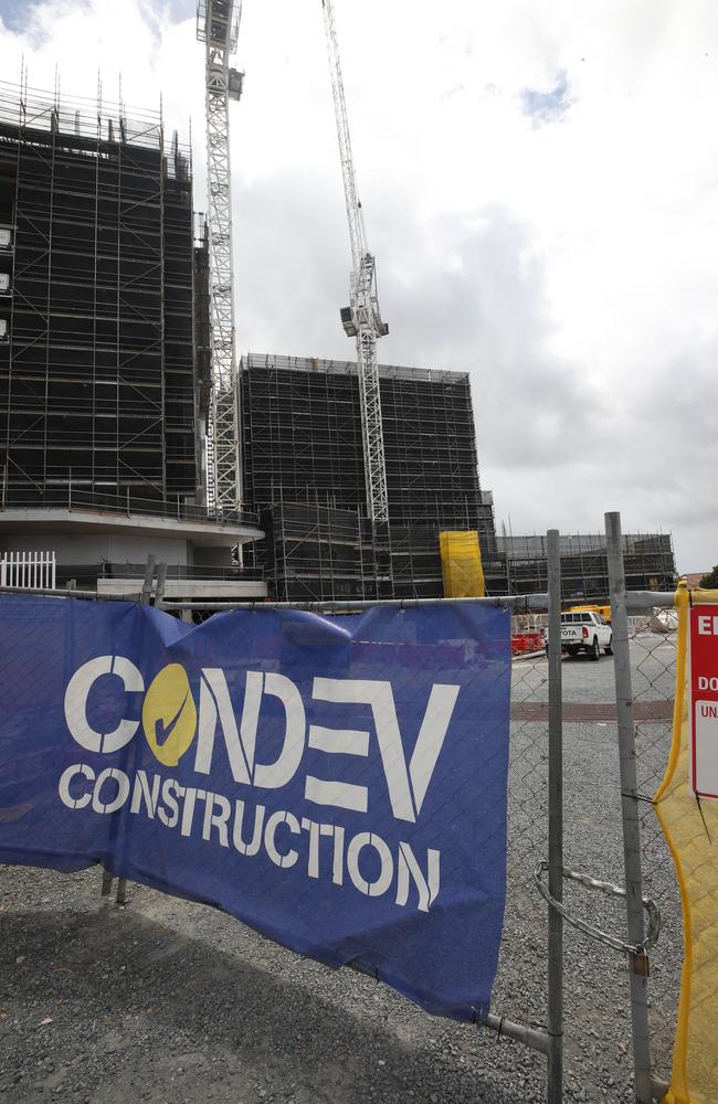 Condev building signage is being removed. Picture: Glenn Hampson