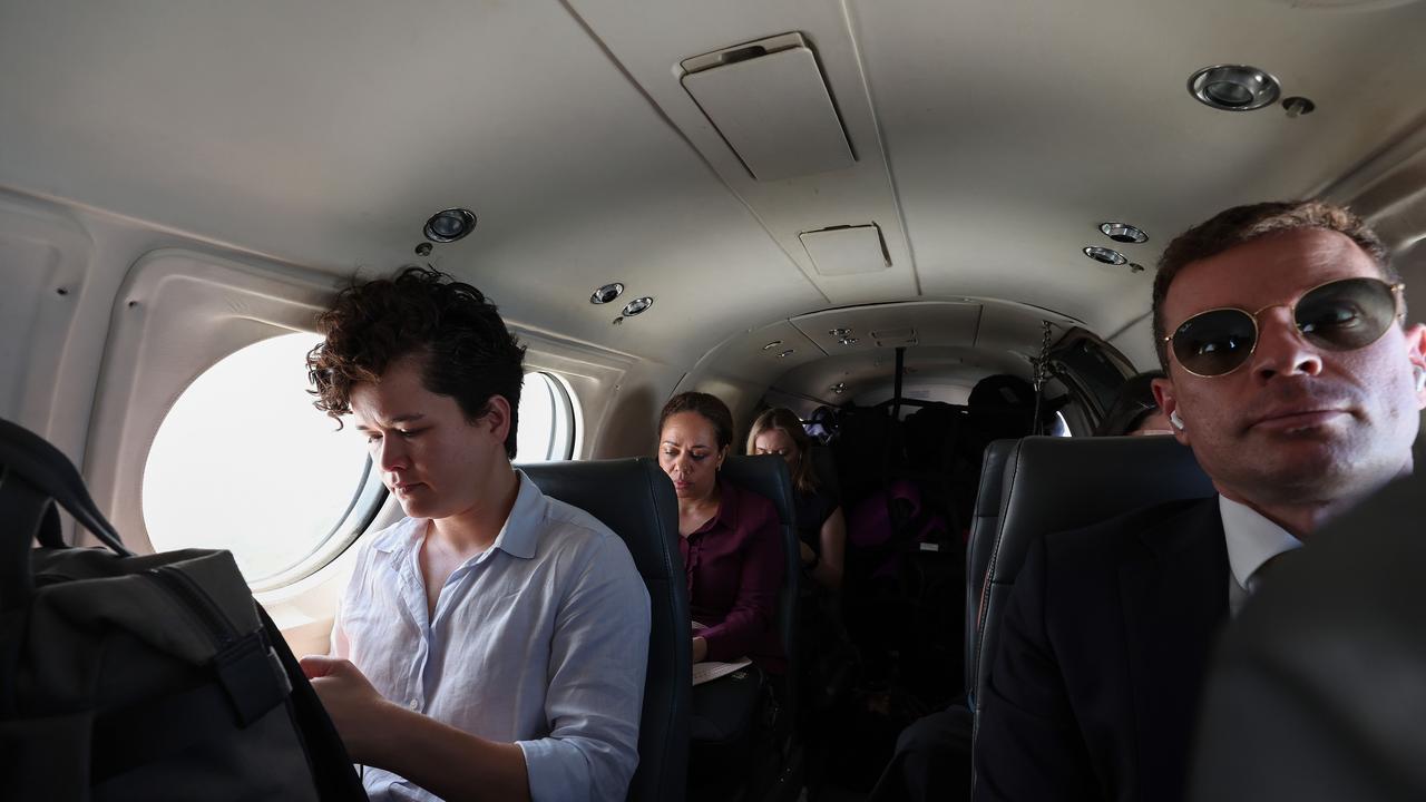 Reporters crammed into the Premier’s SAAB 340B turboprop. Pics Adam Head