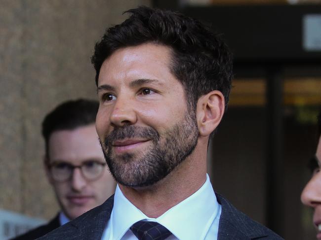 SYDNEY, AUSTRALIA - Newswire Photos - AUGUST 01 2023:  Former Commando Heston Russell is seen leaving the Federal Court in Sydney with his legal team. Russell is suing the ABC for defamation. Picture: NCA Newswire /Gaye Gerardin Sydney. Picture: NCA Newswire /Gaye Gerard