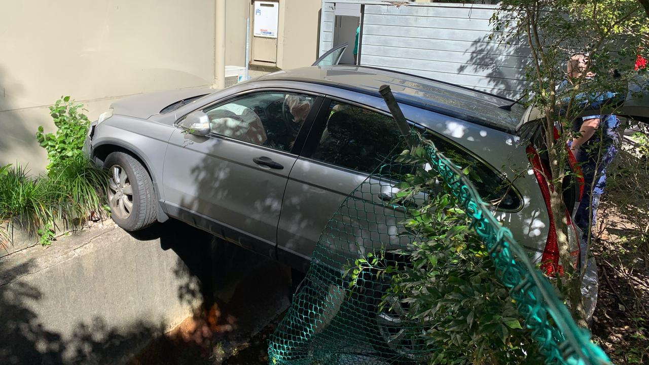 A woman miraculously avoided serious injury after her car jumped a drain in Double Bay. Picture: NSW Ambulance