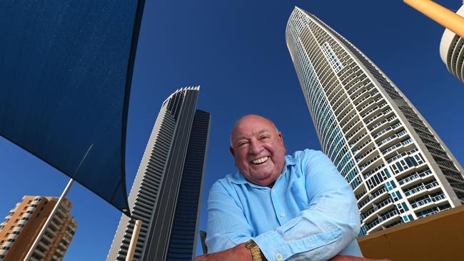 Gold Coast real estate pioneer Max Christmas on the balcony of one of his buildings in Surfers Paradise. Picture: Lyndon Mechielsen/The Australian