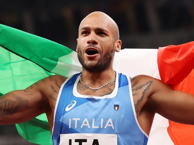 TOKYO, JAPAN - AUGUST 06: Lamont Marcell Jacobs of Team Italy celebrates winning the gold medal in the Men's 4 x 100m Relay Final on day fourteen of the Tokyo 2020 Olympic Games at Olympic Stadium on August 06, 2021 in Tokyo, Japan. (Photo by David Ramos/Getty Images)