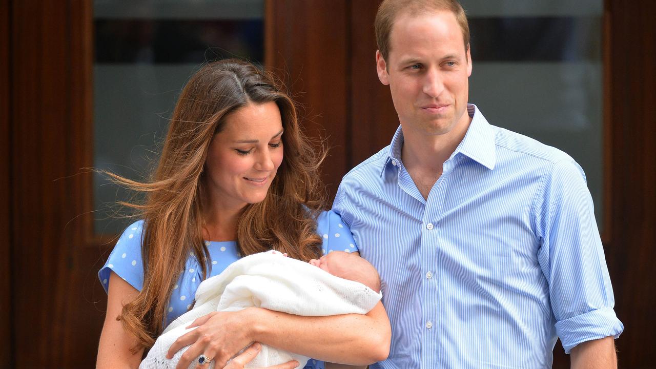 Kate and William posing for pictures with their new baby son, George. Picture: AFP/Leon Neal