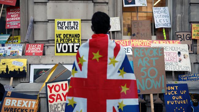 Anti-Brexit placards are placed outside the entrance to the Cabinet Office on Whitehall during the Put It To The People March on March 23, 2019 in London. Picture: Getty Images