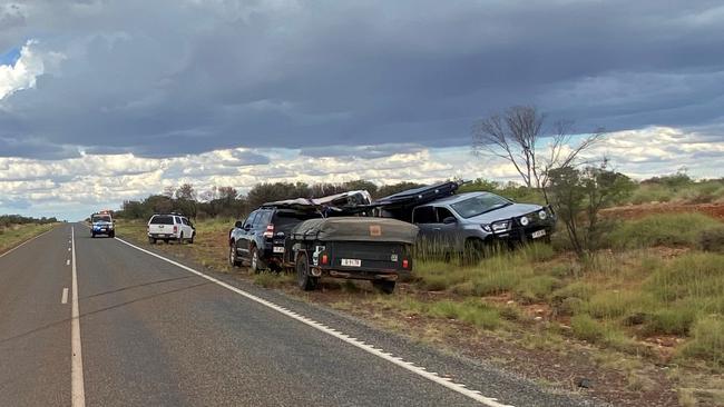 Two German tourists travelling in a hired Hi-Ace van were injured in a single vehicle rollover 15km from Barrow Creek on the Stuart Hwy on Tuesday afternoon. Picture: PFES