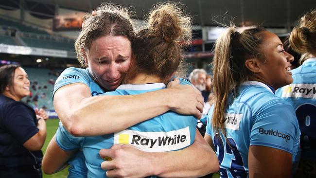 Ashleigh Hewson gets a hug from Cobie-Jane Morgan after NSW’s win.