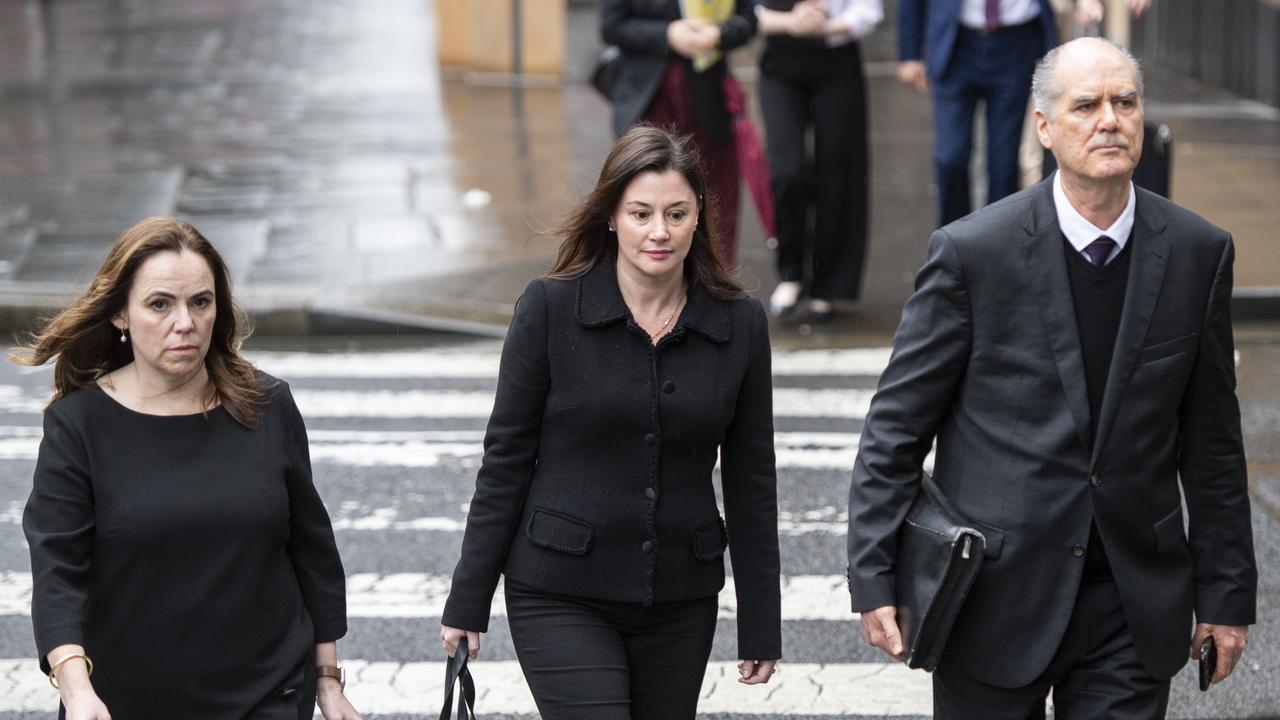 Rebecca Farrell (L) and Amelia Berczelly (C) walking to Federal Court, Sydney, with their lawyer Michael Harmer of Harmers Workplace Lawyers. Picture: Monique Harmer/NewsWire