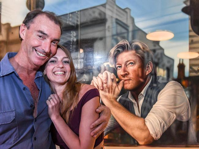 Art Gallery of NSW head packer, Brett Cuthbertson and Perth artist Tessa MacKay and her Packing Room prize-winning hyperreal portrait of renowned actor and producer David Wenham, titled Through the looking glass. Picture: Peter Rae
