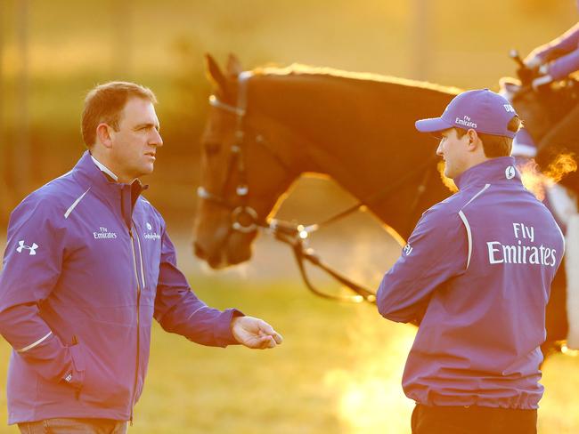 Scottish walks past trainer Charlie Appleby as his routine is discussed. Picture: Mark Stewart