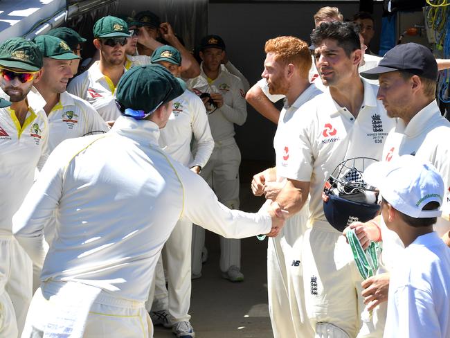 Steve Smith shakes hands with Alastair Cook before play starts. Picture: AAP