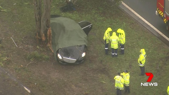 A man, 66, died after a car struck a tree on the median strip on Mona Vale Rd at Terrey Hills, near the Flower Power Garden Centre, on Monday morning. Picture: 7News