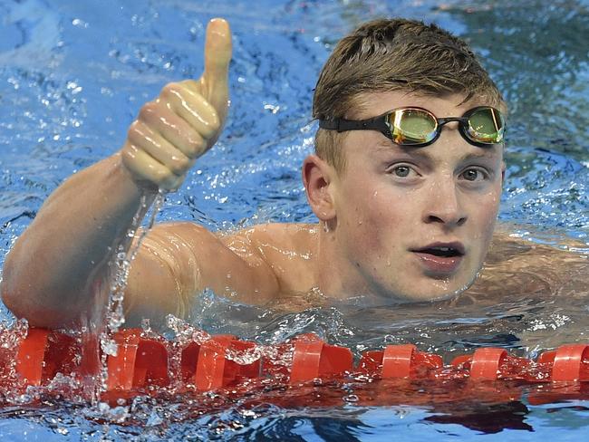 Britain's Adam Peaty set a new world record in his 100-meter breaststroke heat.