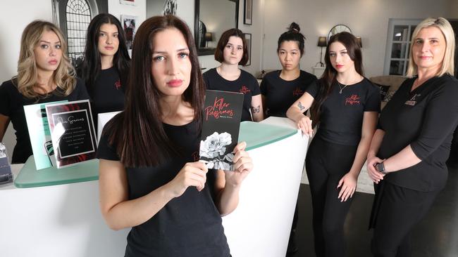 Bee (front) and Ukrainian employee Svitlana, (far right), along with other Killer Russians staff have received death threats. Picture: Dean Martin