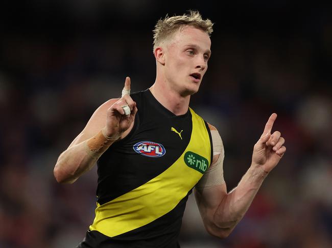 MELBOURNE, AUSTRALIA - AUGUST 04: Noah Cumberland of the Tigers celebrates after scoring a goal during the round 21 AFL match between Western Bulldogs and Richmond Tigers at Marvel Stadium, on August 04, 2023, in Melbourne, Australia. (Photo by Robert Cianflone/Getty Images)