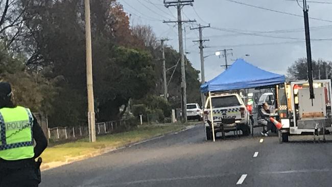 Police have set up a blue tent in the middle of Main Street, Ulverstone. Photo: Helen Kempton