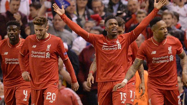 Liverpool's English striker Daniel Sturridge (C) celebrates.