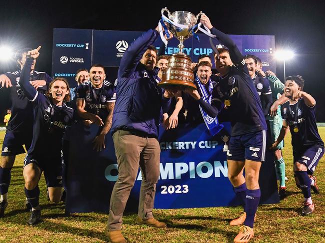 Oakleigh Cannons lift the Dockerty Cup. Picture: Mark Avellino