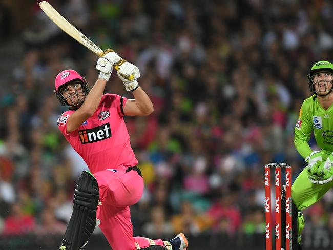 Sixers star Moises Henriques hits out against the Thunder in the Sydney Smash clash. Picture: AAP