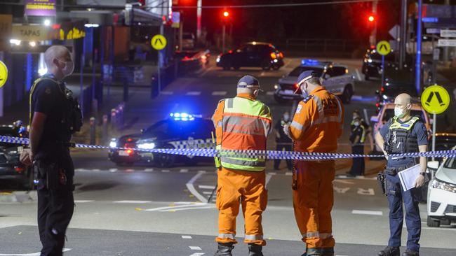 Police at the scene where Cam Smith was allegedly stabbed to death outside Seaford Station. Picture: Jay Town