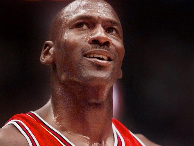 FILE- Michael Jordan looks up at the score during the 3rd quarter of their NBA Finals game against the Utah Jazz, Jun 14 1998. Jordan will announce his retirement from the Bulls on 13/1/99  (AP Photo/Mark/J/Terrill) usa headshot sport basketball