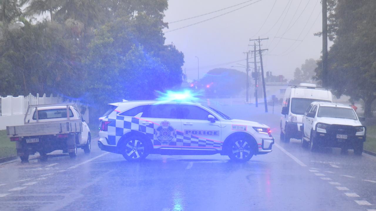 Heavy rain lashes Townsville causing flash flooding. Police block Townsend Street, Mysterton. Picture: Evan Morgan