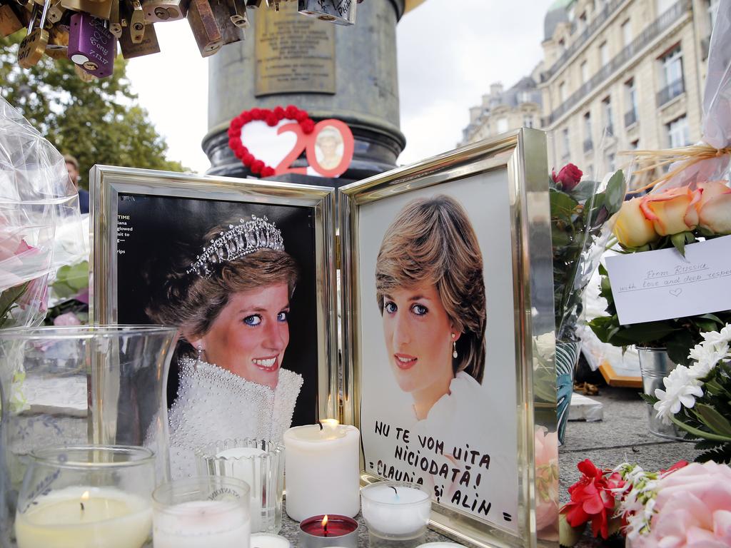 Iconic photos, flowers and messages paying homage to Diana were placed in Paris near the Pont de l'Alma tunnel, the scene of the accident. Picture: Thierry Chesnot/Getty Images.