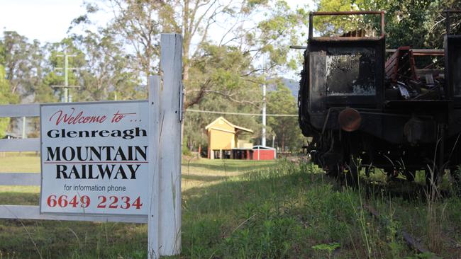 Members of Glenreagh Mountain Railway are hacking through jungle in an effort to assess the state of the rail line. . Photo: Tim Jarrett