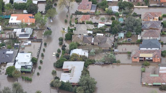 Aerial images of floodwaters in Flemington after the Maribyrnong River flood. Picture: David Caird