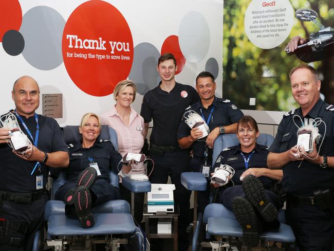 Up to a dozen police officers are giving blood with Red Cross as part of Easter safety message at the Red Cross blood bank In Mt Waverley.L-R  Police officers Attila Hernyak, Sarah O'neil, Vicky Belton Red Cross, Jordan Campbell, Paul Emmanouel, Debbie Day and Peter Barnhooran.Picture: Stuart Milligan