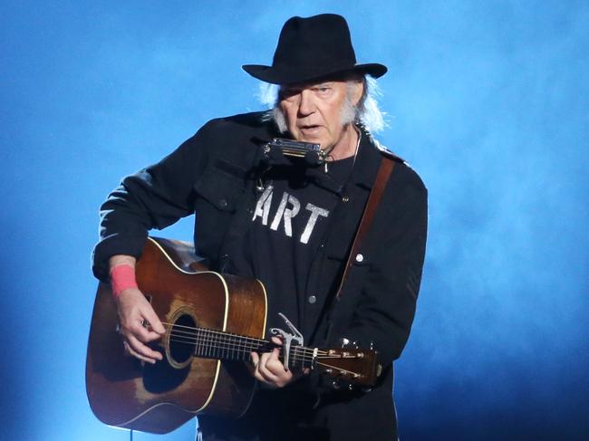 LOS ANGELES, CA - FEBRUARY 06:  Neil Young performs onstage during the 2015 MusiCares Person of The Year honoring Bob Dylan held at Los Angeles Convention Center on February 6, 2015 in Los Angeles, California.  (Photo by Michael Tran/FilmMagic)