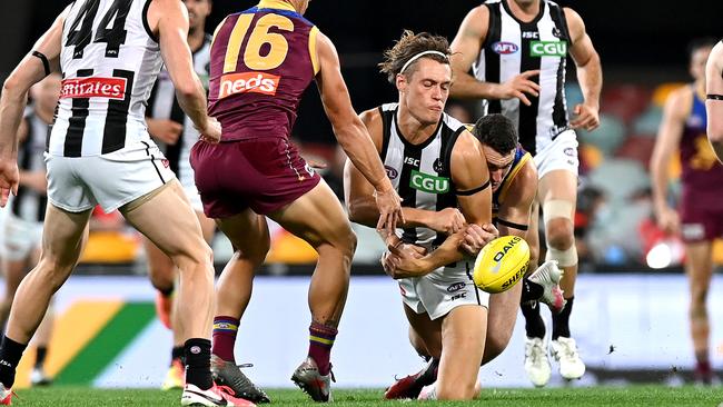 Darcy Moore was thrust forward after Lions defender Harris Andrews went off injured, in an effort to stretch the depleted Brisbane backline. Picture: Bradley Kanaris/Getty Images