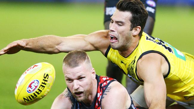 Alex Rance tackles Jake Stringer.