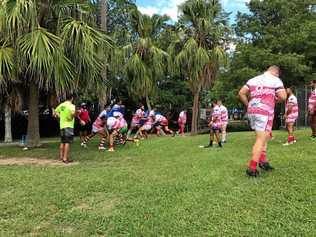 South Grafton Rebels run through final pre-match drills before their clash with Navy Tridents. Picture: Xavier Sullivan