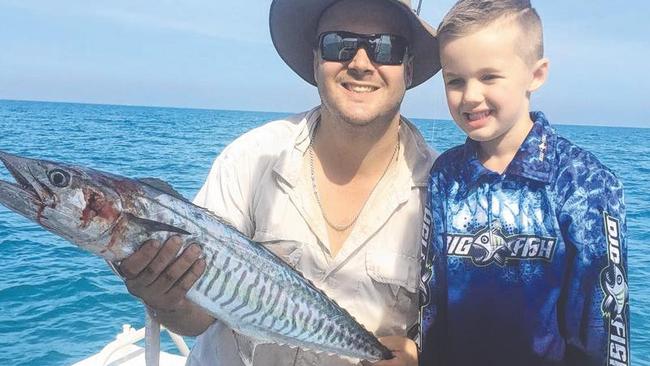 David O'Neill and son Tate with Tate's first Spanish mackerel