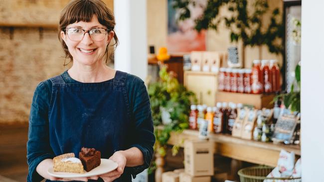 Sweet treats: Tamsin Carvan in the Borough Dept. Store in Korumburra, where she sells cakes and other local produce and goods. Picture: Chloe Smith