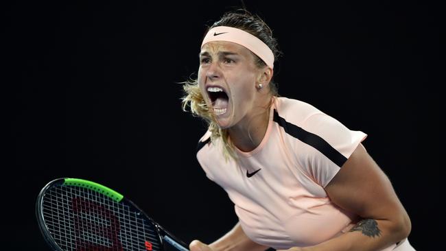 Holla back girl: Belarus' Aryna Sabalenka gets shouty with it on the way to losing to strong, silent Aussie Ashleigh Barty at the Australian Open. Picture: AAP