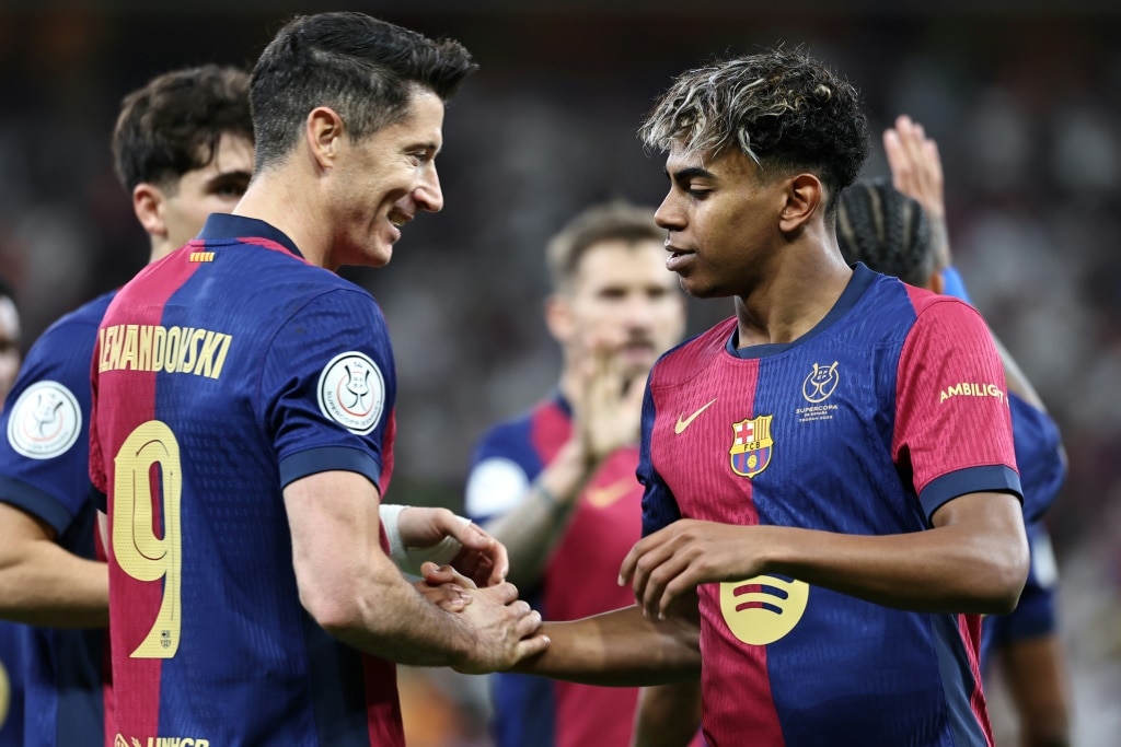 Lamine Yamal celebrates with Robert Lewandowski after scoring in Jeddah