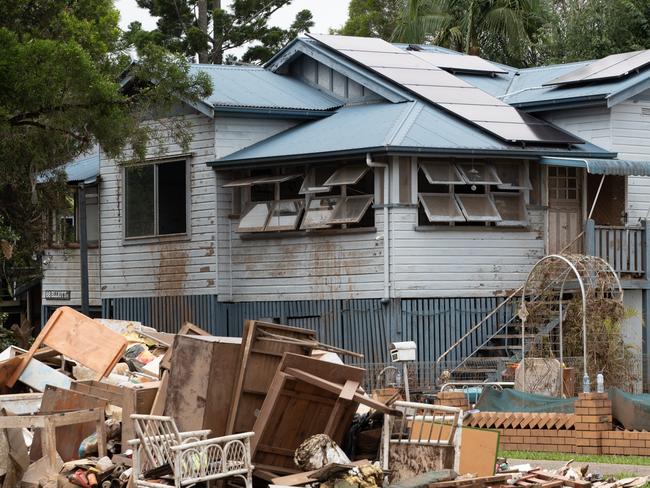 Masses of debris in Lismore on March 10 last year. Picture: Danielle Smith