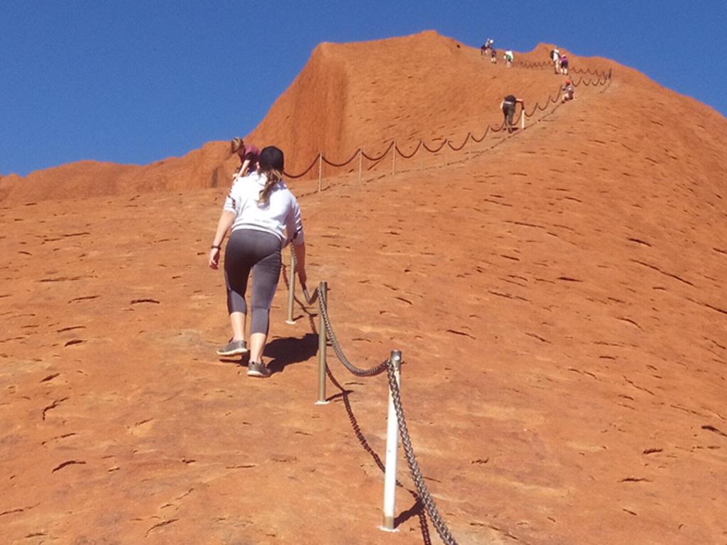 Climbing Ululu - Photo taken looking up the climb. My daughters in mid ground. Picture By Marc Hendrickx