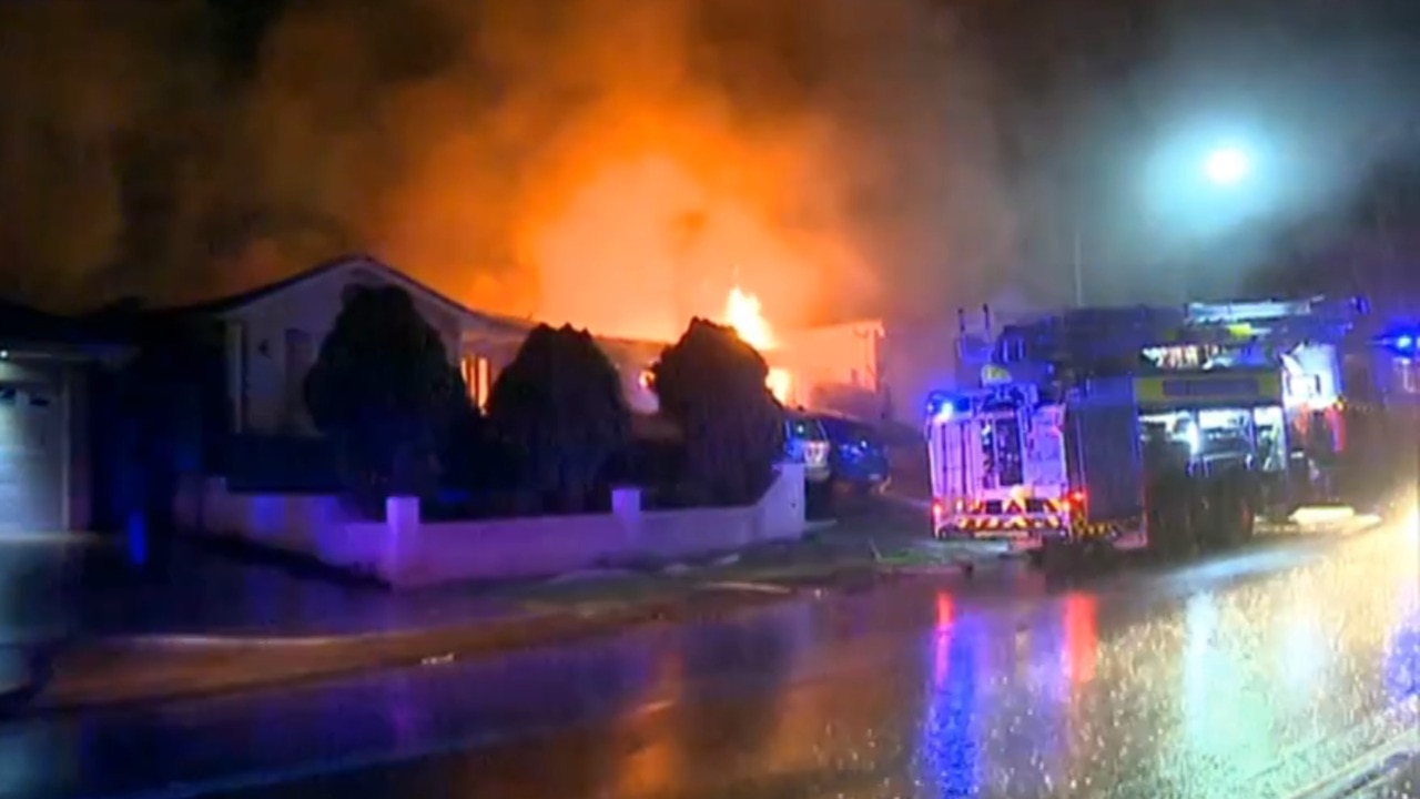 Two men save Sydney family from burning home