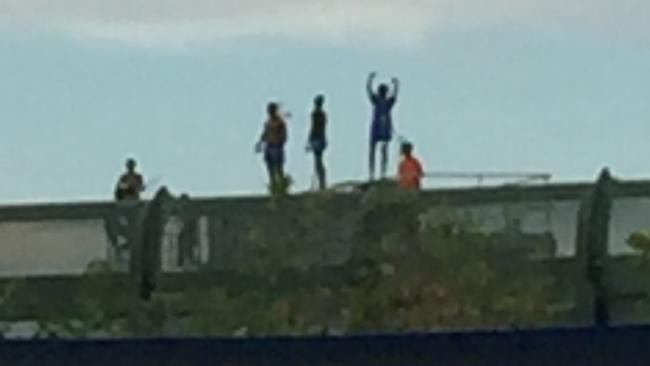 Youth on the roof of Cleveland Youth Detention Centre in Townsville. Picture: Domanii Cameron