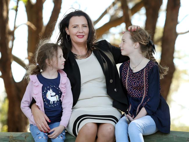 Nicole Montgomery, pictured with daughters Lily and Ella Grace, has launched a website to help patients find trusted surgeons. Picture: Richard Dobson