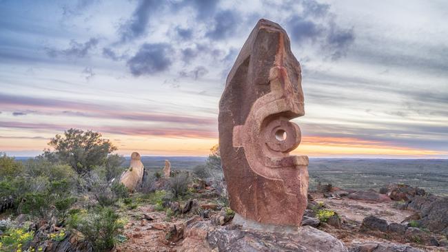 The sun sets over sculptures in The Living Desert and Sculptures attraction, Broken Hill. Picture: Destination NSW