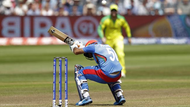 Hashmatullah Shahidi ducks a bouncer off the bowling of Mitchell Starc in Bristol.