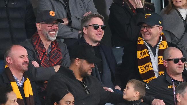 Lance Franklin chats with Prime Minister Anthony Albanese in the stands at Manuka Oval. Picture: Morgan Hancock/Getty Images